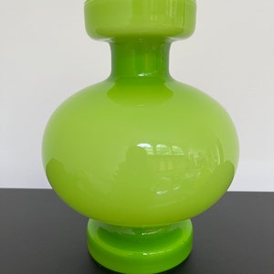 Vintage Mid Century Modern Per Lutken Holmegaard Green Carnaby cased glass Vase.  Green Carnaby cased glass vase, 8” tall.