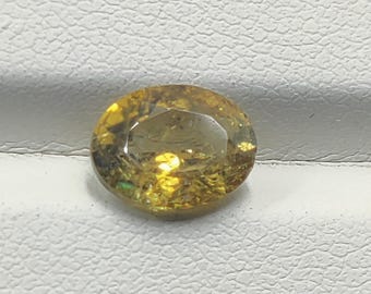 Tanzanita natural na cor amarela facetada formato oval 7x9 para confecção de joias quilates 1,75