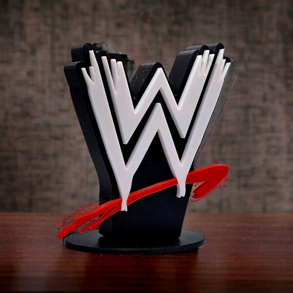 Logo autoportant à gratter WWE / WWF. taille 4 po x 5 po.