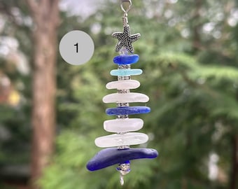 Adorno para árbol de vidrio marino. Desliza el dedo para ver 20 opciones.