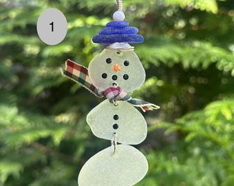 Beach glass snowman ornament with top hat, scarf and silver ribbon