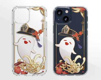 May include: Two clear phone cases with a white ghost wearing a black hat and a gold trim. The ghost is surrounded by red and gold flowers. The phone case on the left has a white background and the phone case on the right has a dark blue background.