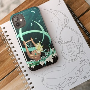 May include: A phone case with a green and white design featuring a lyre, flowers, and swirling lines.