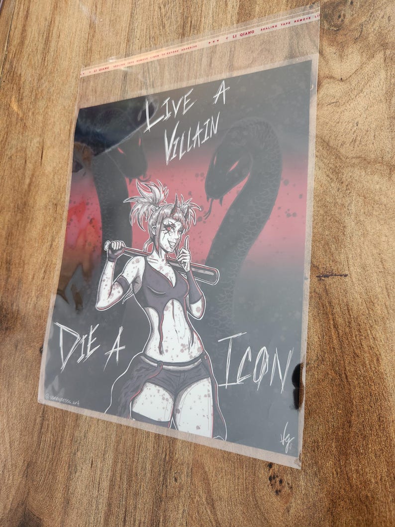 May include: A black and white illustration of a woman with pink hair holding a baseball bat. The background is red and black with the text "Live a Villain Die a Icon".