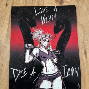 May include: A digital illustration of a woman with horns and a baseball bat. She is wearing a black top and shorts. The background is red and black with two snakes. The text "Live a Villain Die a Icon" is written on the image.