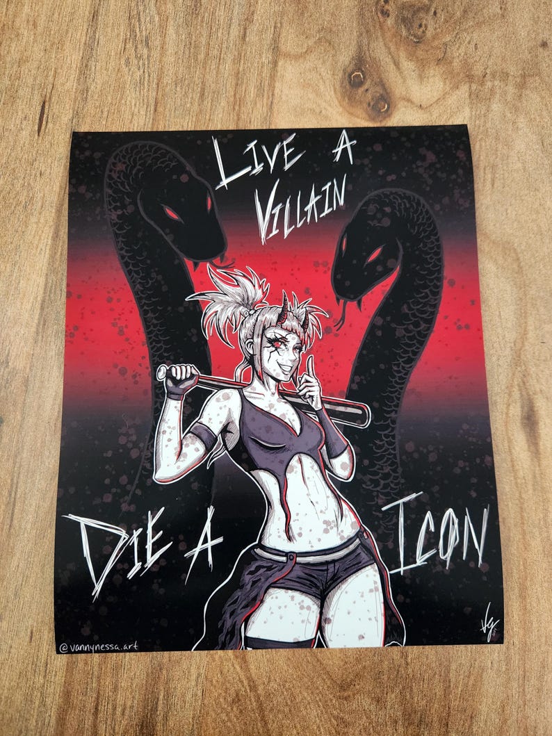 May include: A digital illustration of a woman with horns and a baseball bat. She is wearing a black top and shorts. The background is red and black with two snakes. The text "Live a Villain Die a Icon" is written on the image.