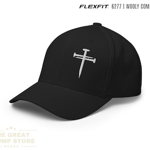 Embroidered Flexfit baseball cap featuring a bold three nails cross. This nail cross hat doubles as a cross baseball cap and religious baseball hat, offering a standout three nails hat for Christian hats and Christian hats for men. It is further recognized as a cross hat, cross hats men, 3 nails flexfit hat, Christian cross cap, nail and cross hat, baseball hat embroidered cross, black hat with cross, mens fitted christian hat, rusty nails cross cap, three nail flex fit hat, 3 cross hat.