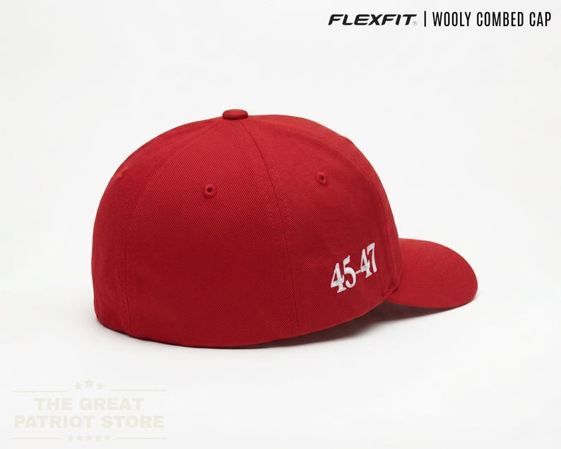 May include: A red baseball cap featuring the text FLEXFIT | WOOLY COMBED CAP at the top and the white embroidered numbers 45-47 on the side. The cap has a structured crown, a curved brim, and a solid red fabric construction throughout the design.