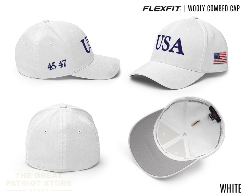 May include: A white Flexfit wooly combed cap featuring the text USA in blue on the front, the number 45-47 on the side, and a small American flag patch on the other side. The cap is shown from multiple angles, including the interior lining.