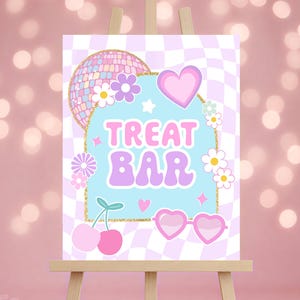 May include: A colorful "Treat Bar" sign on an easel. The sign features a disco ball, flowers, hearts, and cherries. The text "Treat Bar" is in a retro font, with a light blue background and a checkered pattern.