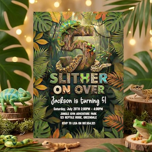 May include: A birthday invitation with a jungle theme, featuring the text "SLITHER ON OVER" and "Jackson is turning 5!". The design includes a snake, chameleons, and tropical leaves. Toy reptiles are placed around the invitation.