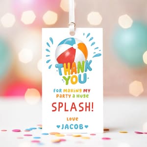May include: A white thank you tag with a colourful beach ball illustration. The text reads "Thank You for making my party a huge SPLASH! Love Jacob".