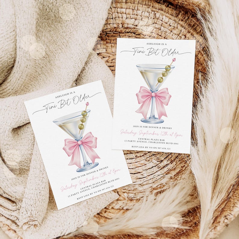 May include: Two invitation cards with a martini glass illustration. The martini glass has olives and a pink bow. The text on the card reads "Ashleigh is a Tini Bit Older" and details for a dinner and drinks event.