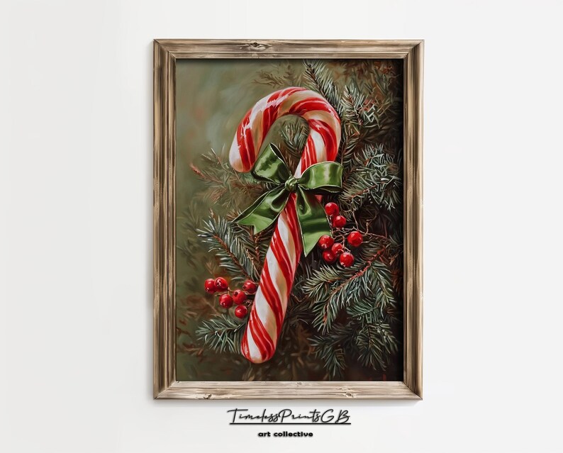 May include: A framed print depicting a candy cane with red and white stripes, a green bow, and red berries, set against evergreen branches. The artwork is signed "TimelessPrintsGB art collective". The image evokes a festive Christmas theme.