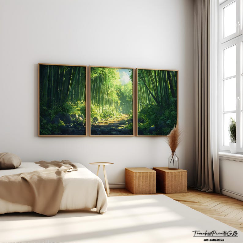 May include: A triptych of framed art prints depicting a bamboo forest path bathed in sunlight. The artwork features lush green bamboo stalks and a pathway leading into the distance. The frames are a warm, natural wood tone, complementing the serene forest scene.