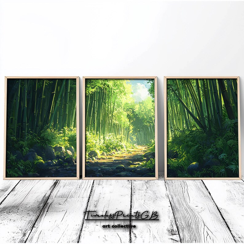 May include: Set of three framed art prints depicting a lush bamboo forest scene. The artwork features vibrant green bamboo stalks, ferns, and a path leading into the sunlight. The frames are a light wood color, and the overall theme is nature and landscape.