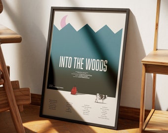 May include: A black framed poster with the title "INTO THE WOODS" in white text. The poster features a stylized illustration of a forest with a red hooded figure and a cow.