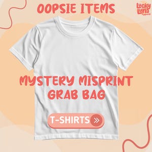 May include: A white t-shirt with the text "OOPSIE ITEMS" and "MYSTERY MISPRINT GRAB BAG" in red. The shirt has a crew neck and short sleeves. The words "T-SHIRTS" are in a pink box with a right arrow.