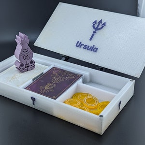 Ursula box and Marker with A type tokens.
"Almost complete" does not include acrylic tokens.
Game shown for demonstration purposes only, listing does not include a copy of the game.