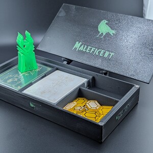 Maleficent box and Marker, shown with type B
"Almost complete" does not include tokens.
Game shown for demonstration purposes only, listing does not include a copy of the game.