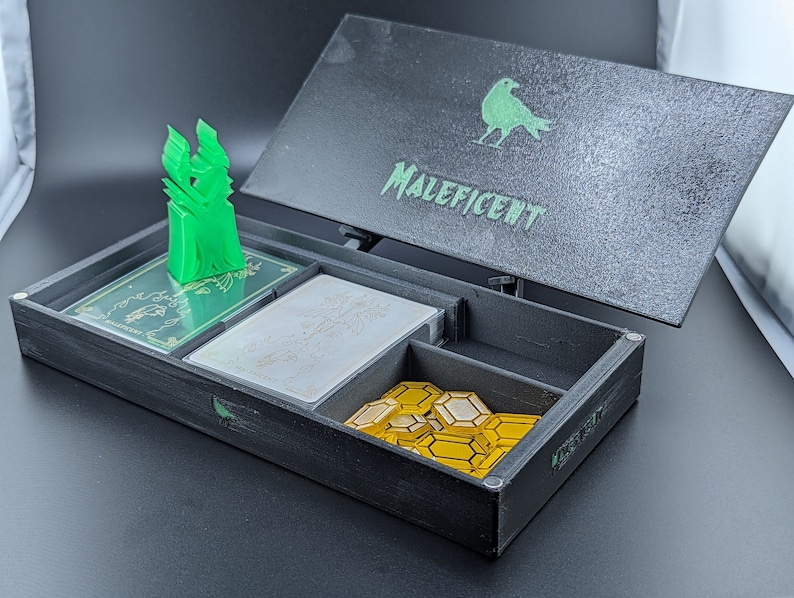 Maleficent box and Marker, shown with type B
"Almost complete" does not include tokens.
Game shown for demonstration purposes only, listing does not include a copy of the game.