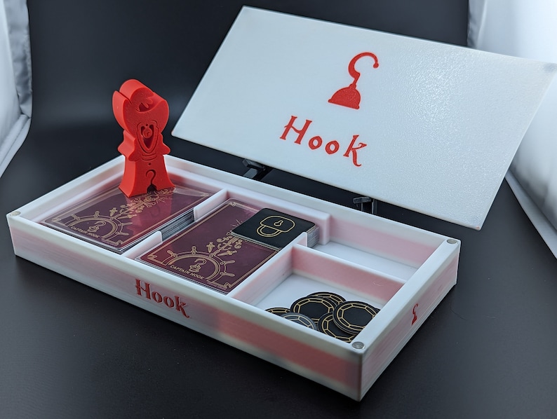Hook box and Marker shown with the tokens that come in the base game
"Almost complete" does not include acrylic tokens.
Game shown for demonstration purposes only, listing does not include a copy of the game.