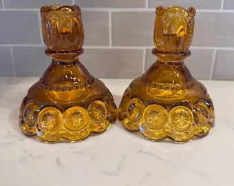 Pair of L.E. Smith Amber Color Moon and Stars Candlestick Holders