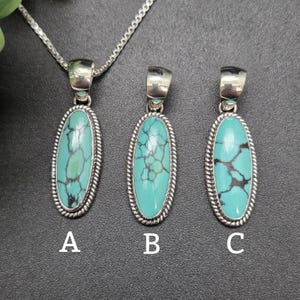 May include: Three oval turquoise pendants with dark matrix patterns, each set in a silver frame with a twisted rope border. Pendant A is attached to a silver chain, while pendants B and C are displayed individually. Each piece is labeled A, B, or C.