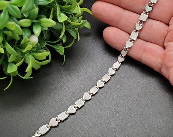 ナバホ族のハンドメイド レッド ファイア オパール インレイ オニキス