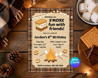 May include: A rectangular birthday invitation card featuring a brown plaid border and a string of lights. The text reads: Birthdays are S'MORE fun with friends! Join us to celebrate Jordan's 8th Birthday, Saturday November 22nd, 5:00-7:00 PM, 1001 Campfire Lane, Your City, ST 55555, RSVP to Ashley: 555-555-5555. The design includes a cartoon s'more and a campfire graphic.