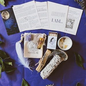 May include: A manifesting ritual kit containing a white feather, a small bag with crystals, a bottle of essential oil, a white sage smudge stick, a palo santo stick, a box of matches, a candle, and a card with the text "I AM READY, WILLING, AND ABLE TO LIVE THE LIFE OF MY DREAMS, CO-CREATE WITH THE UNIVERSE, GRACIOUSLY RECEIVE UNCONDITIONAL LOVE. I AM..."