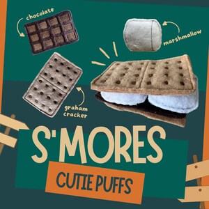 May include: A set of felt food items for pretend play, including a graham cracker, chocolate bar, and marshmallow. The items are arranged to look like a s'more. The text "S'mores Cutie Puffs" is written below the food items.