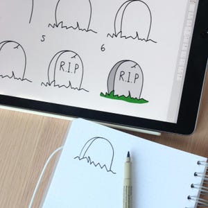 May include: A step-by-step drawing tutorial on a digital tablet screen showing how to draw a tombstone with the words "R.I.P." on it. The drawing is in black and white with green grass.
