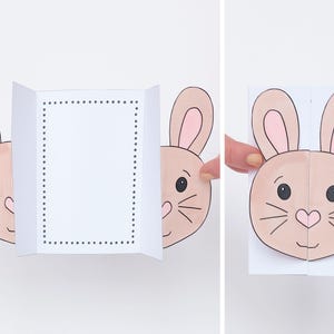 K&ouml;nnte beinhalten: Eine Pop-up-Karte mit einem Hasengesicht. Die Karte ist in der Mitte gefaltet und das Hasengesicht springt heraus, wenn die Karte ge&ouml;ffnet wird. Der Hase hat rosa Ohren, braunes Fell und schwarze Augen.