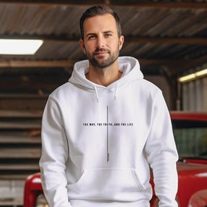 May include: White hooded sweatshirt with the text "THE WAY, THE TRUTH, AND THE LIFE" printed on the front.