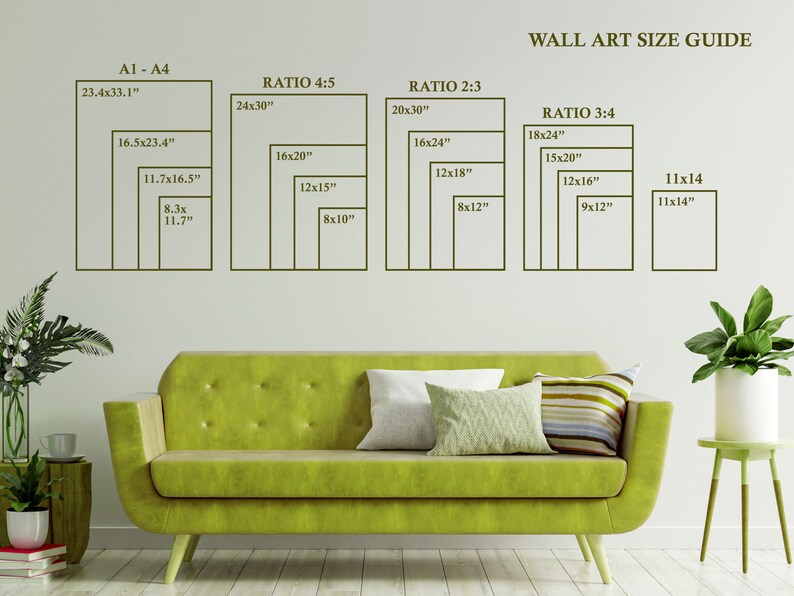May include: A wall art size guide with different ratios and dimensions in inches. The guide shows the sizes of art prints in a variety of ratios, including 4:5, 2:3, and 3:4. The guide is displayed on a white wall with a green sofa and a plant in the foreground.