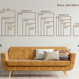 May include: A wall art size guide with dimensions in inches is displayed above a mustard-colored sofa. The guide includes sizes for A1-A4, Ratio 4:5, Ratio 2:3, Ratio 3:4, and 11x14. The text "WALL ART SIZE GUIDE" is at the top.