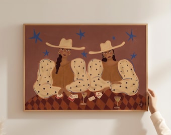 May include: A rectangular wall art print featuring two figures in wide-brimmed hats and puffy-sleeved shirts playing cards at a table with a brown and black diamond pattern. The background is a muted brown with scattered blue star shapes.