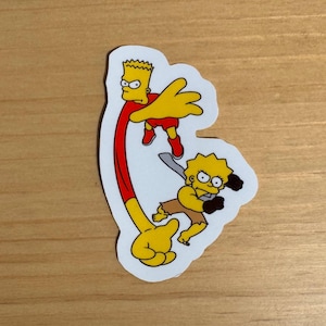 Simpsons Treehouse of Horror Stretch Dude e Clobber Girl Adesivo de Vinil Forte