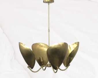 Gleaming Elegance: The Radiance of a Handmade Brass Chandelier