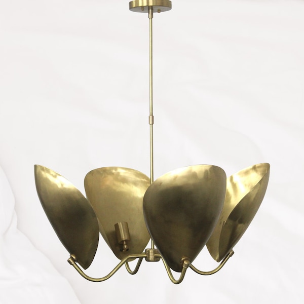 Gleaming Elegance: The Radiance of a Handmade Brass Chandelier