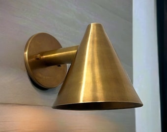 Refined Radiance: Artisanal Raw Brass Wall Lamp for Your Home