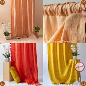 May include: Four fabric samples in different colors: spice, orange, fluorescent orange, and mustard yellow. The spice-colored fabric is draped, while the orange fabric is folded. The fluorescent orange and mustard yellow fabrics are also draped. The mustard yellow sample has an "OUT OF STOCK" sticker.