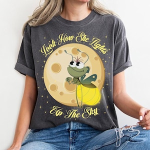 Disney Princess And The Frog Firefly Ray Comfort Colors T-Shirt, Tiana&#39;s Bayou Adventure Shirt, Look How She Lights Up The Sky Tee
