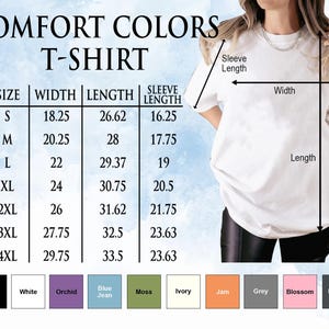 a woman wearing a white t - shirt and black leggings