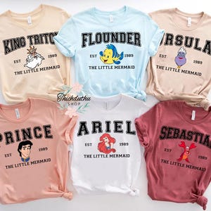 a bunch of shirts that are on a table