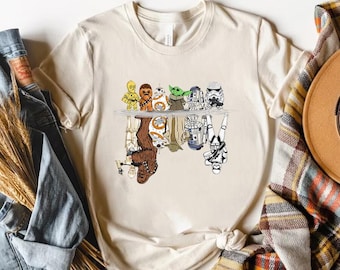 Camiseta Star Wars com reflexo na água e cores confortáveis, camiseta Star Wars com personagem Chibi, camiseta Galaxy's Edge para férias na Disneylândia