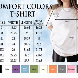 a woman wearing a white t - shirt and black leggings