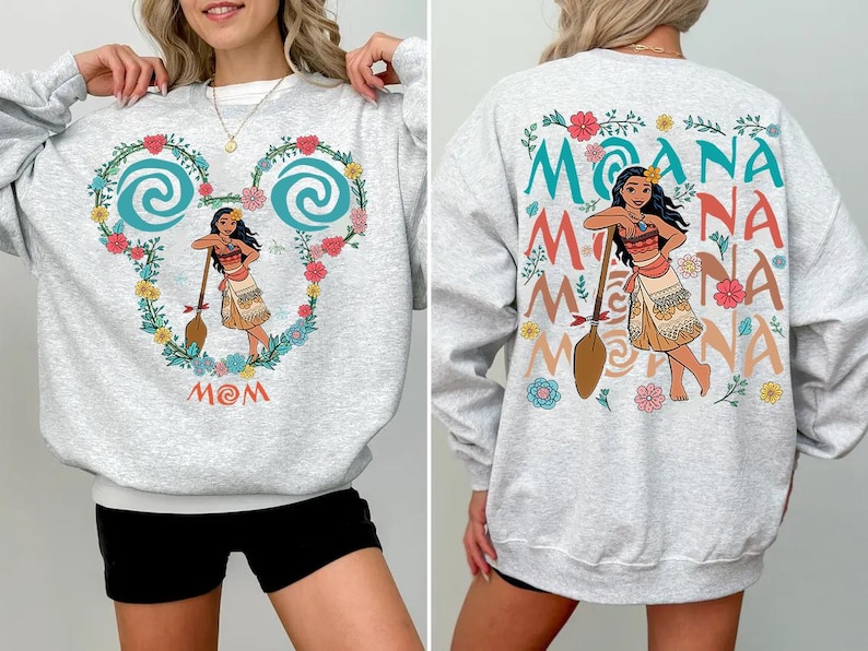 a woman wearing a moan moan sweatshirt and shorts