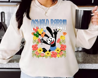Comfortkleuren Disney bloemen T-shirt Oswald het gelukskonijn, shirt Disney Oswald konijn bloemen, T-shirt Oswald Walt Disney Studio,